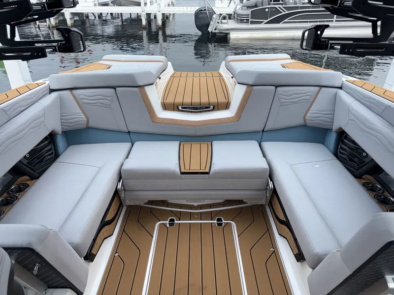 Slide: The Image of The image shows the luxurious cockpit of a 2027 Nautique G23 with elegant seating. - 15