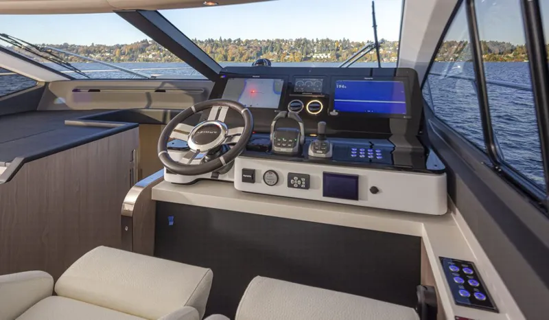 Slide: The Image of Interior view of the helm station on an Azimut 60 Fly yacht. - 12