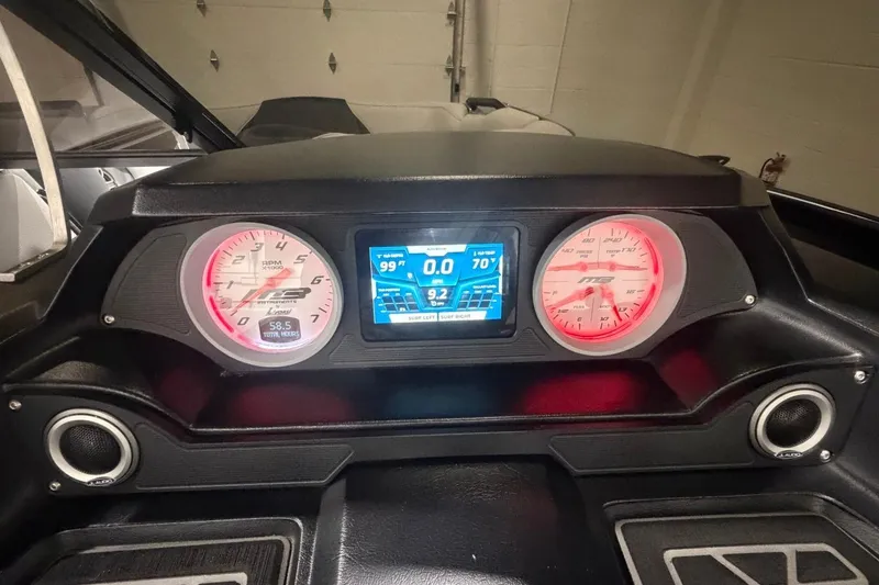 Slide: The Image of Dashboard of 2024 MB B52 23 Classic boat with illuminated gauges and digital display. - 32