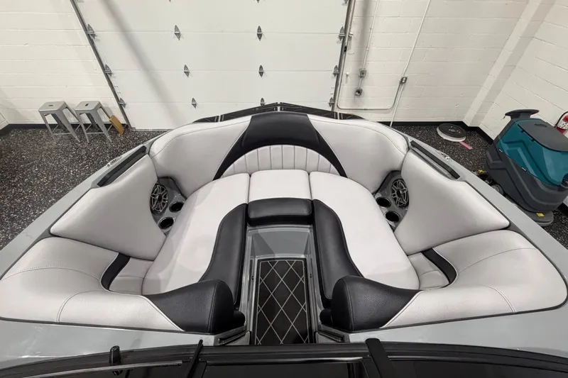 Slide: The Image of Luxurious interior of 2024 MB B52 23 Classic boat with sleek seating design. - 10