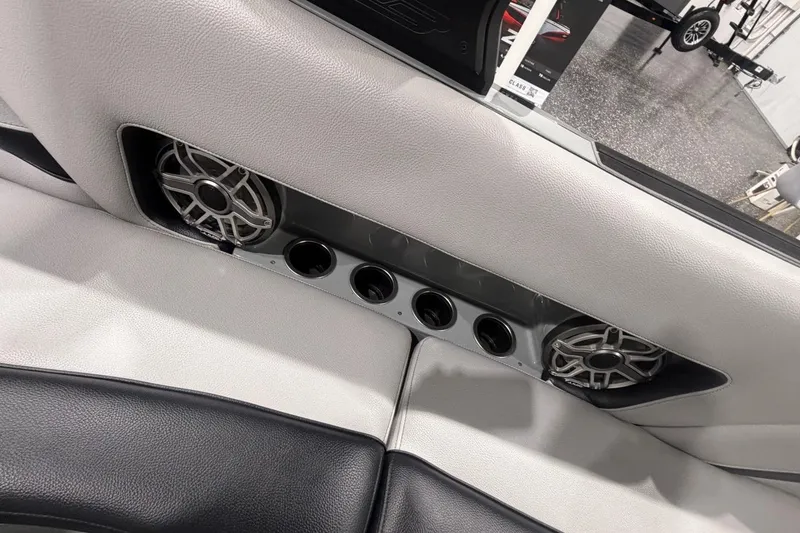 Slide: The Image of Interior of 2024 MB B52 23 Classic with sleek speaker and cup holder design. - 65