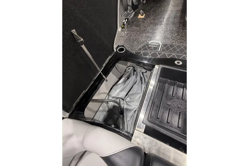 Slide: The Image of 2024 MB B52 23 Classic boat interior storage compartment with sleek design and durable materials. - 59