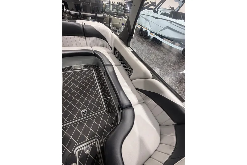Slide: The Image of Luxurious interior of 2024 MB B52 23 Classic boat with sleek seating design. - 42
