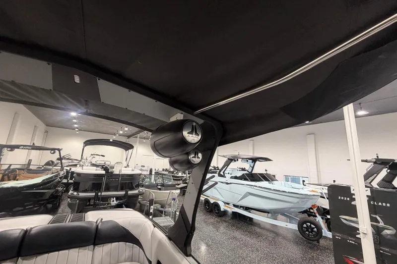 Slide: The Image of 2024 MB B52 23 Classic boat interior with sleek design and modern features in showroom. - 25