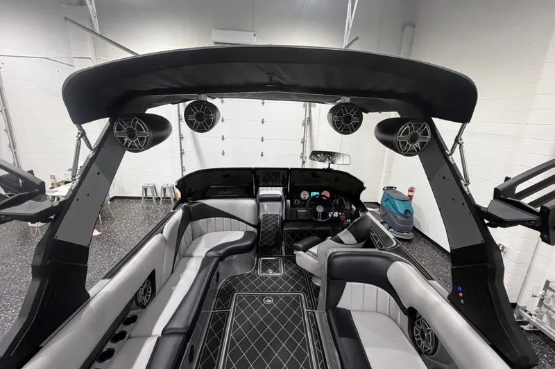 Slide: The Image of 2024 MB B52 23 Classic boat interior with premium seating and advanced audio system. - 49