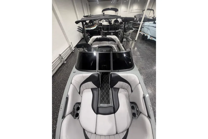 Slide: The Image of 2024 MB B52 23 Classic boat interior with sleek seating and modern design. - 18