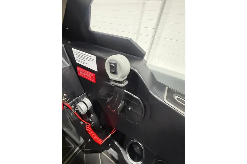 Slide: The Image of Interior of 2024 MB B52 23 Classic, featuring control panel and safety equipment. - 30
