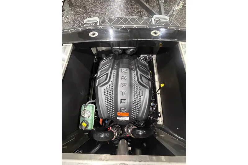 Slide: The Image of 2024 MB B52 23 Classic boat engine compartment featuring a Raptor engine. - 62