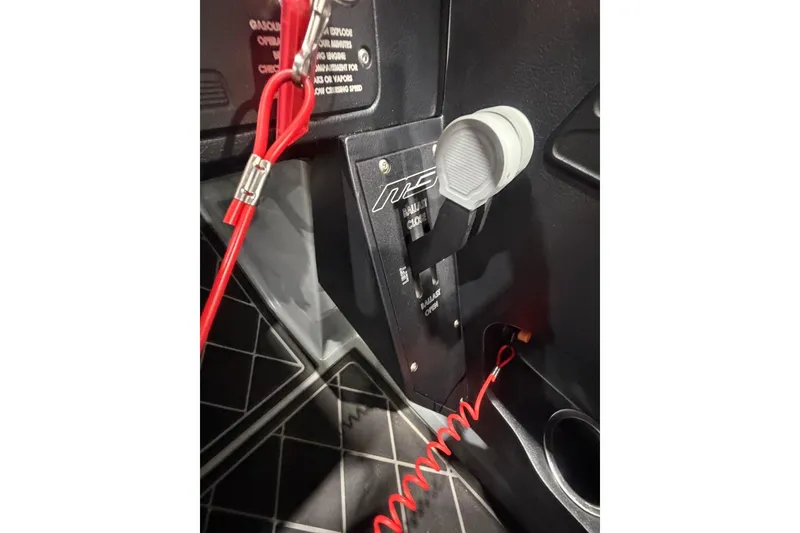 Slide: The Image of 2024 MB B52 23 Classic interior detail with red safety cord and control panel. - 29
