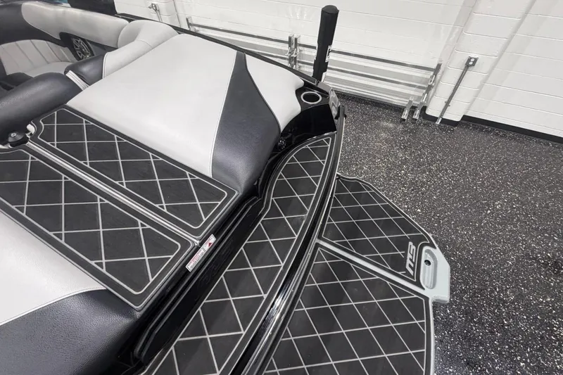 Slide: The Image of 2024 MB B52 23 Classic boat interior with diamond-patterned upholstery and sleek design. - 54