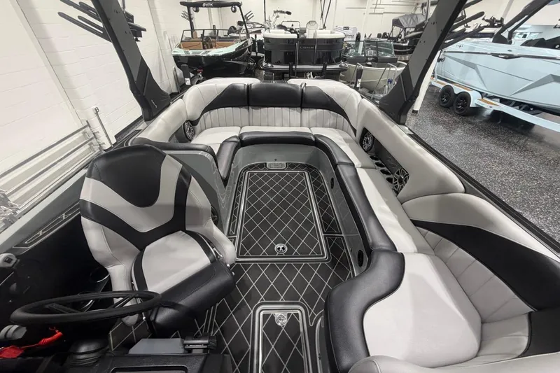 Slide: The Image of 2024 MB B52 23 Classic boat interior with sleek seating and modern design. - 21