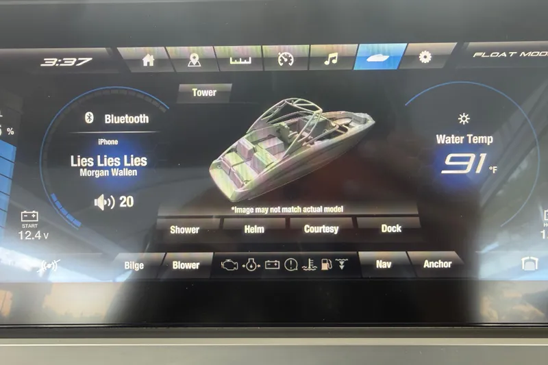 Slide: The Image of Dashboard of a 2022 Yamaha Boats 252SD showing music and water temperature. - 40