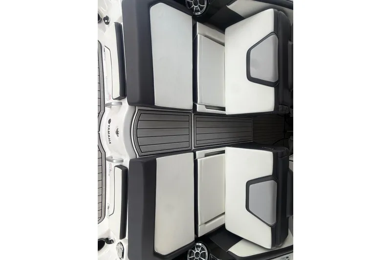 Slide: The Image of 2022 Yamaha Boats 252SD interior seating with sleek, modern design and comfortable upholstery. - 8