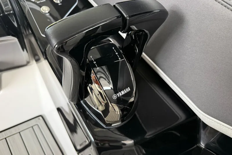 Slide: The Image of Close-up of 2022 Yamaha Boats 252SD throttle control lever. - 46