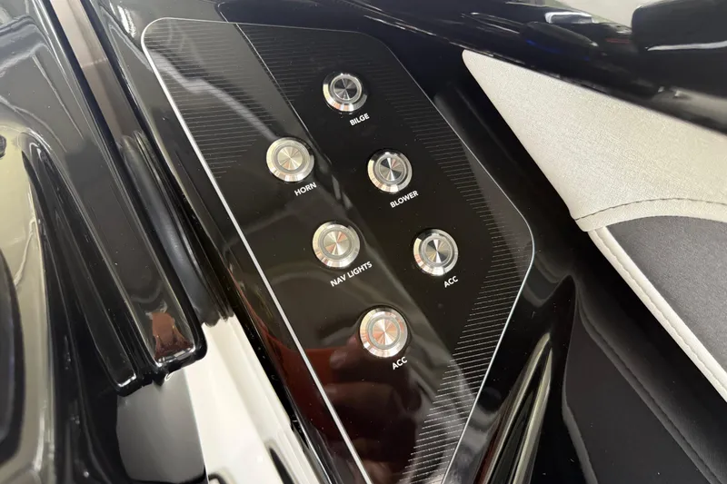 Slide: The Image of Control panel of 2022 Yamaha Boats 252SD with labeled buttons for various functions. - 45