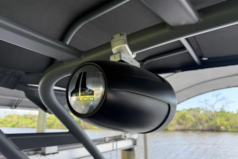 Slide: The Image of Speaker system on 2022 Yamaha Boats 252SD, featuring JL Audio, under canopy. - 66