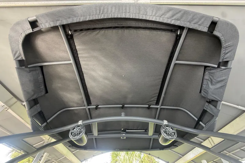 Slide: The Image of 2022 Yamaha Boats 252SD canopy with speakers, viewed from below. - 60