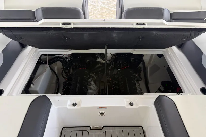 Slide: The Image of 2022 Yamaha Boats 252SD engine compartment with dual engines visible. - 23