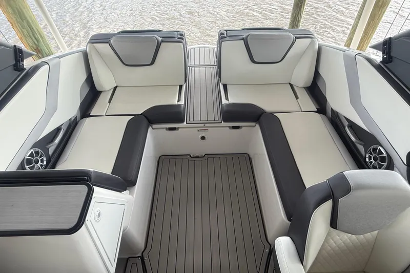 Slide: The Image of 2022 Yamaha Boats 252SD interior with sleek seating and modern design. - 14