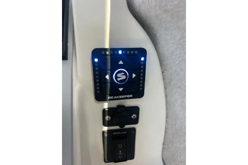 Slide: The Image of Control panel of 2023 Defiance Guadalupe 290 EX boat with Seakeeper system. - 16