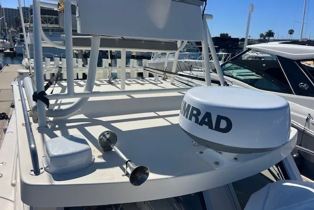 Slide: The Image of 2023 Defiance Guadalupe 290 EX boat with radar equipment at marina. - 19