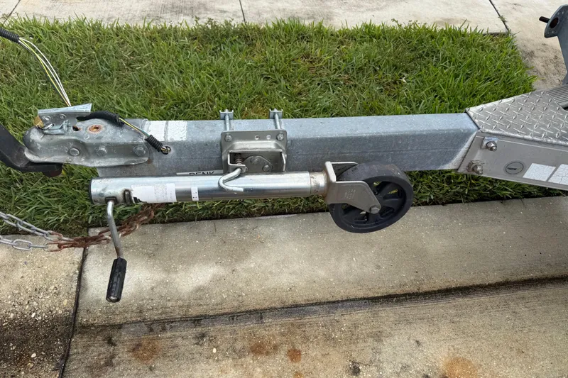 Slide: The Image of Trailer hitch and wheel assembly for 2017 Hurricane SunDeck 187 OB boat. - 23