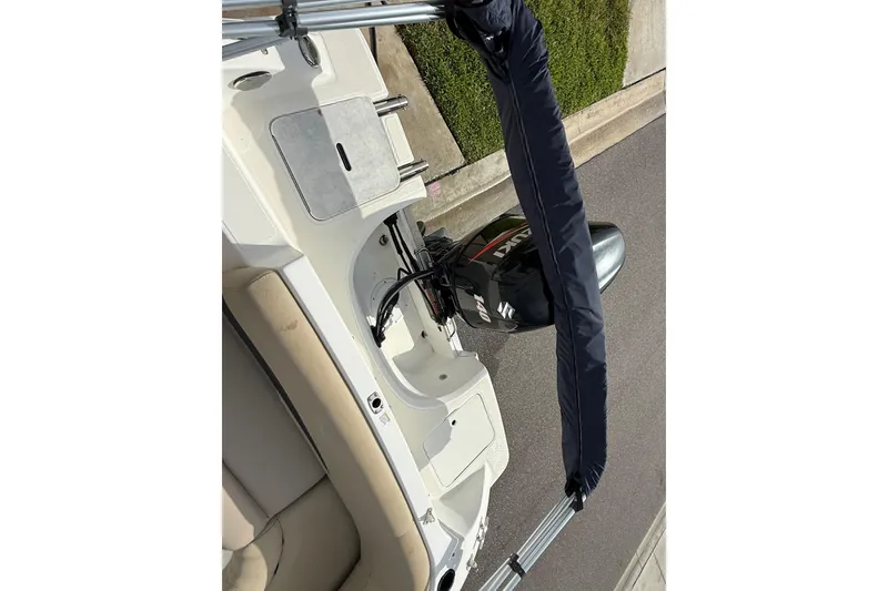 Slide: The Image of 2017 Hurricane SunDeck 187 OB boat with Suzuki outboard motor, viewed from above. - 9