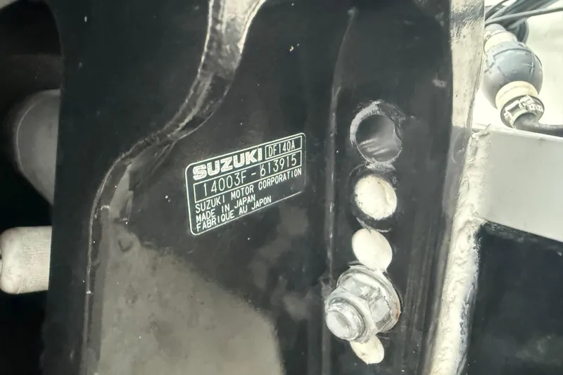Slide: The Image of Close-up of Suzuki motor label on 2017 Hurricane SunDeck 187 OB boat. - 28