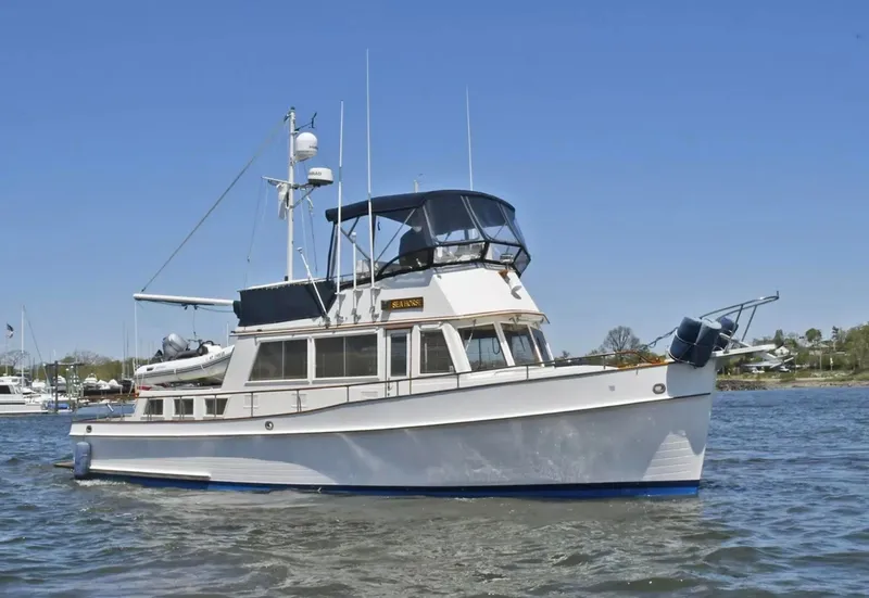 Slide: The Image of 1989 Grand Banks 42 Classic on calm water. - 2
