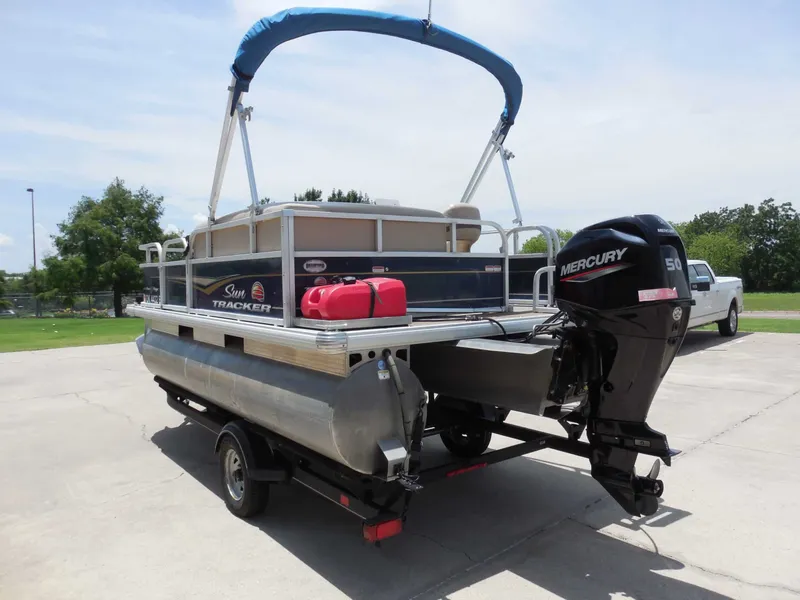 Slide: The Image of A 2020 Sun Tracker BASS BUGGY 16XL pontoon boat with a Mercury 50 HP outboard motor. - 5