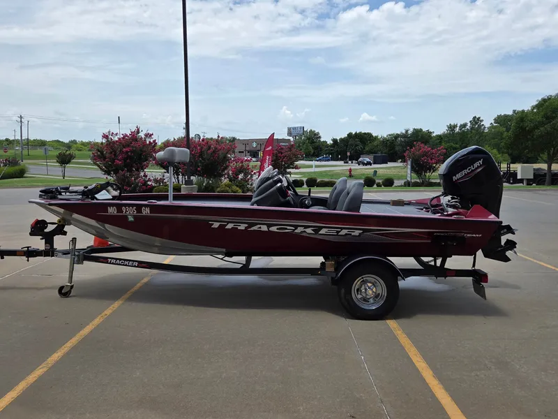 Slide: The Image of Tracker Pro Team 175 TXW 2022 parked on a trailer outdoors. - 5