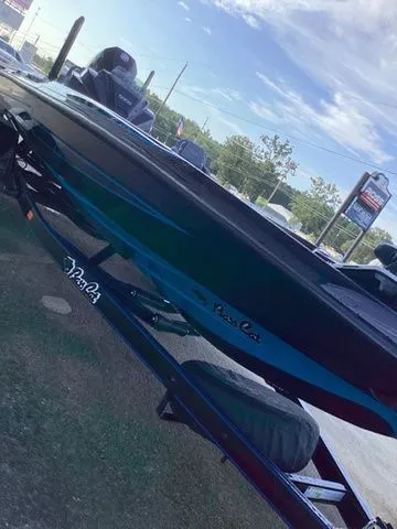 Slide: The Image of A 2026 Bass Cat Lynx STS on a trailer, ready for the water. - 30
