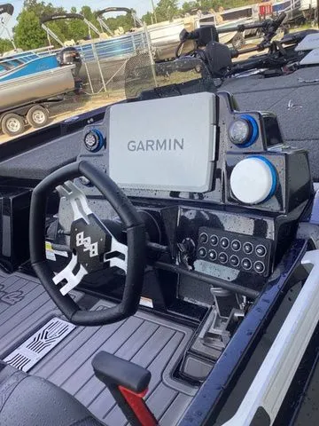 Slide: The Image of The image shows the cockpit of a Bass Cat Lynx STS with a Garmin navigation system. - 37