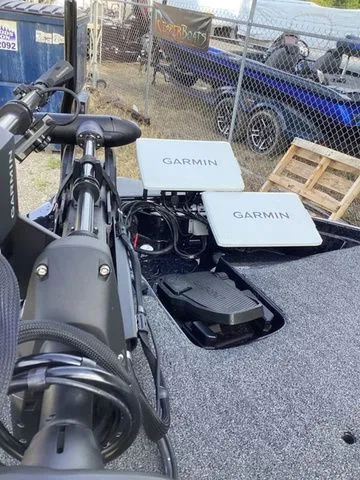 Slide: The Image of The image shows the cockpit of a Bass Cat Lynx STS with Garmin electronics. - 21