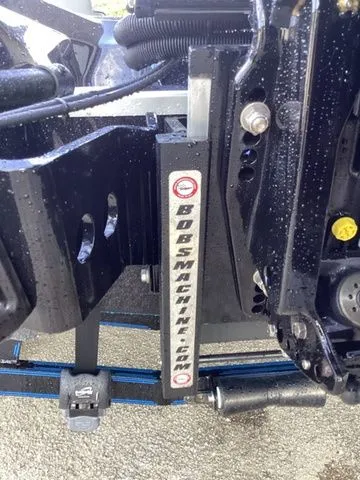 Slide: The Image of Close-up of a boat lift mechanism with "bobsmachine.com" on it. - 6