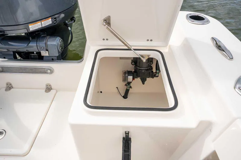 Slide: The Image of Open hatch on 2026 Bay Rider 219 Bay boat, revealing internal components. - 33