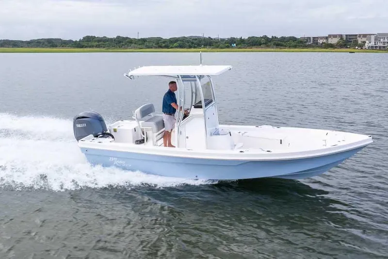 The Image of Manufacturer Provided Image: 2025 Bay Rider 219 Bay boat cruising on water with Yamaha engine. - 0