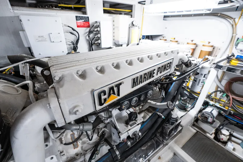 Slide: The Image of CAT Marine Power engine in a 2003 Symbol 56 yacht engine room. - 93