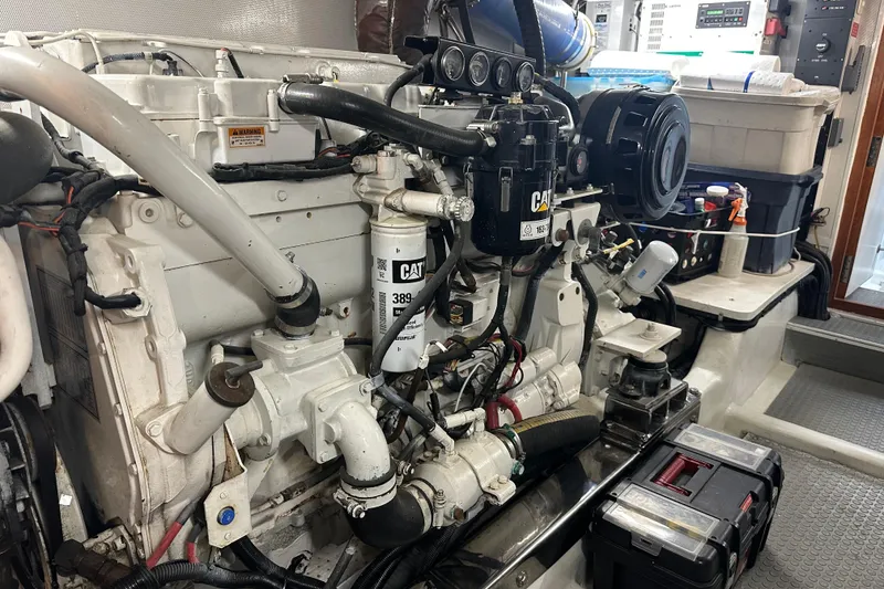 Slide: The Image of Engine room of a 2003 Symbol 56 yacht with CAT machinery and tools. - 66