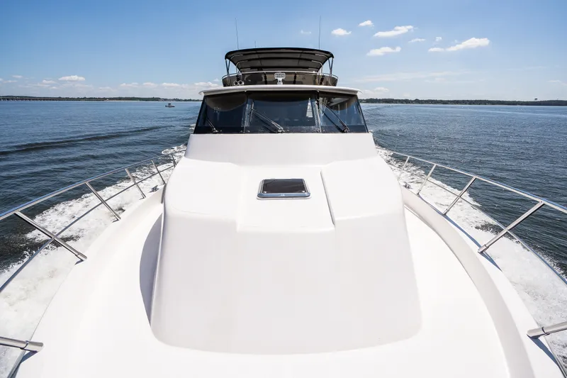 Slide: The Image of Luxury yacht cruising on open water, Symbol 56 model, 2003. - 22