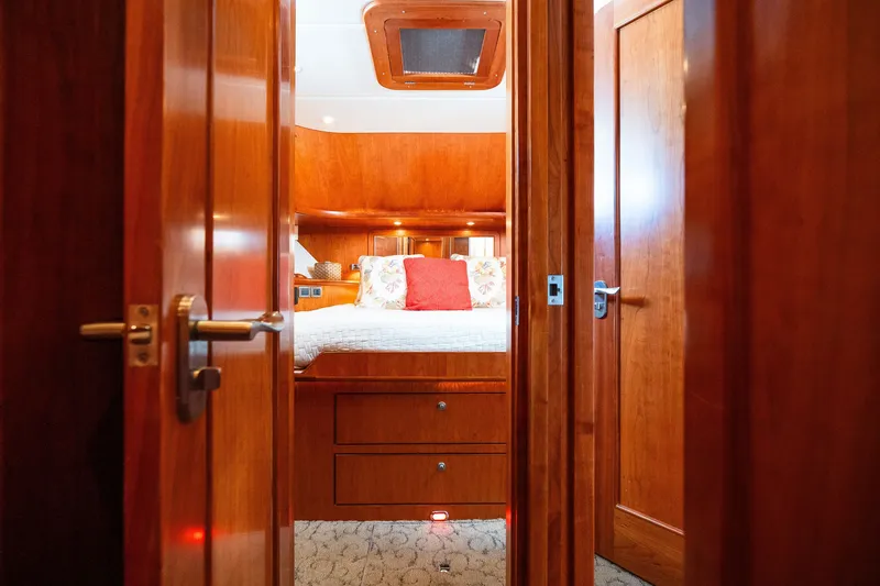 Slide: The Image of Luxurious wooden cabin interior on a 2003 Symbol 56 yacht. - 86