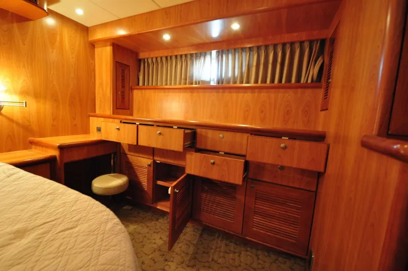 Slide: The Image of Luxurious wooden cabin interior with drawers and ambient lighting, Symbol 56 yacht, 2003 model. - 25