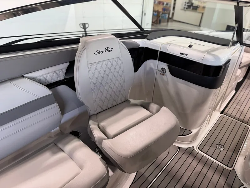 Slide: The Image of Interior of a 2024 Sea Ray SLX 260 Surf boat with sleek seating. - 19