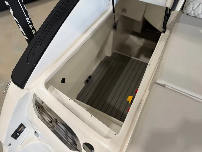 Slide: The Image of A view of the storage compartment on a 2024 Sea Ray SLX 260 Surf boat. - 15