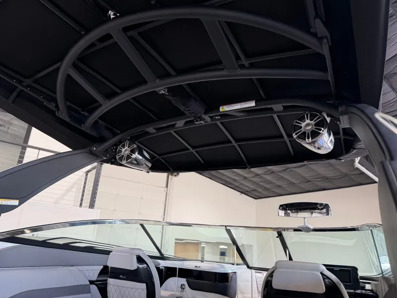 Slide: The Image of Interior view of a Sea Ray SLX 260 Surf boat with modern design. - 11