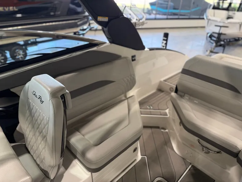 Slide: The Image of Interior of a Sea Ray SLX 260 Surf boat with sleek seating and modern design. - 18