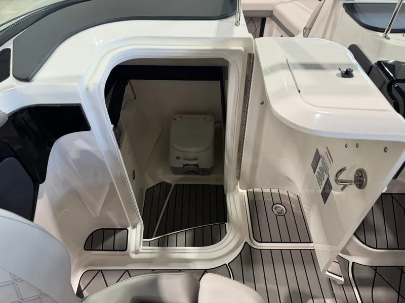 Slide: The Image of The image shows the interior of a boat cabin area with a toilet. - 21