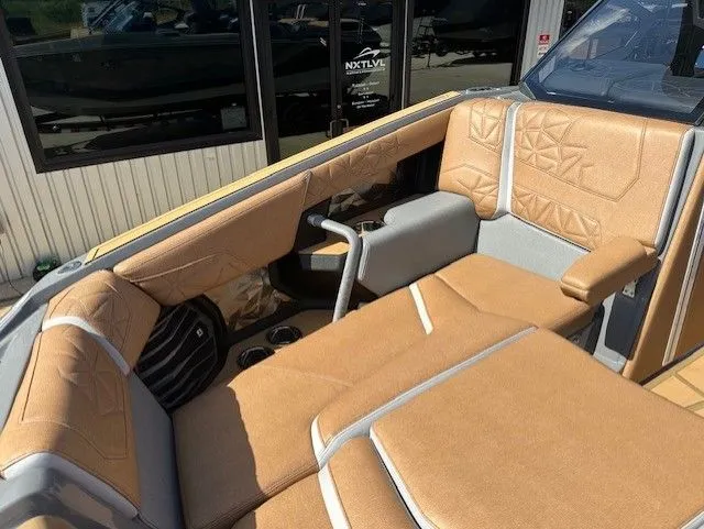 Slide: The Image of Interior of a Nautique Super Air Nautique G25 Paragon with beige upholstery and modern details. - 32