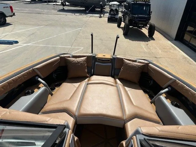 Slide: The Image of The image shows the bow of a Nautique Super Air Nautique G25 Paragon with luxurious leather seating. - 31