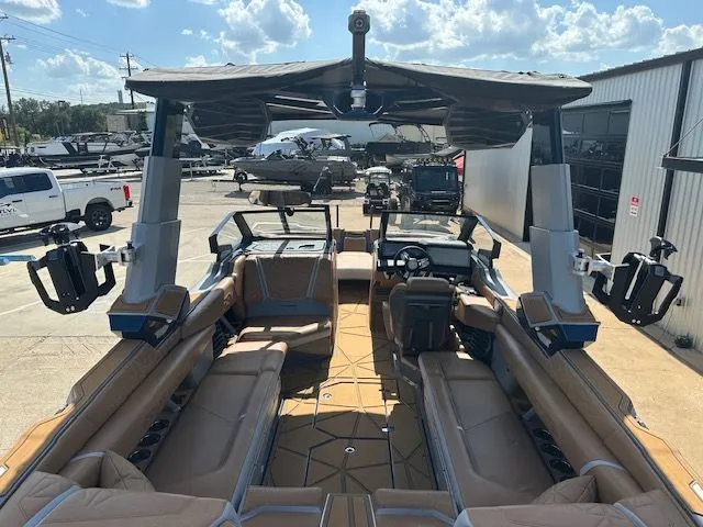 Slide: The Image of The image shows the interior of a 2025 Super Air Nautique G25 Paragon with luxurious seating and modern design. - 18